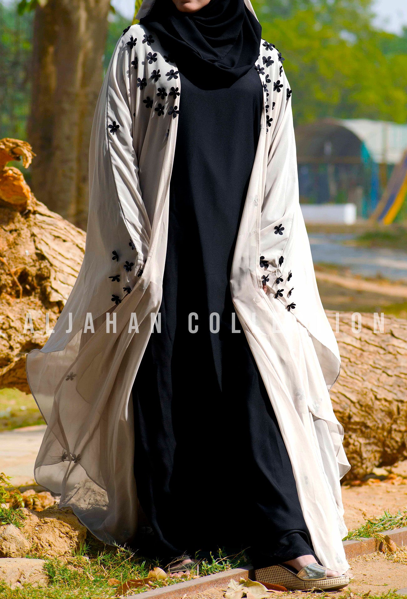 https://aljahan.com/cdn/shop/products/High-Multi-Chiffon-Abaya-in-Arabic-Style-as-a-Upper-With-Straight-Black-Inner-in-Nida-fabric-2210@2x.jpg?v=1673521170